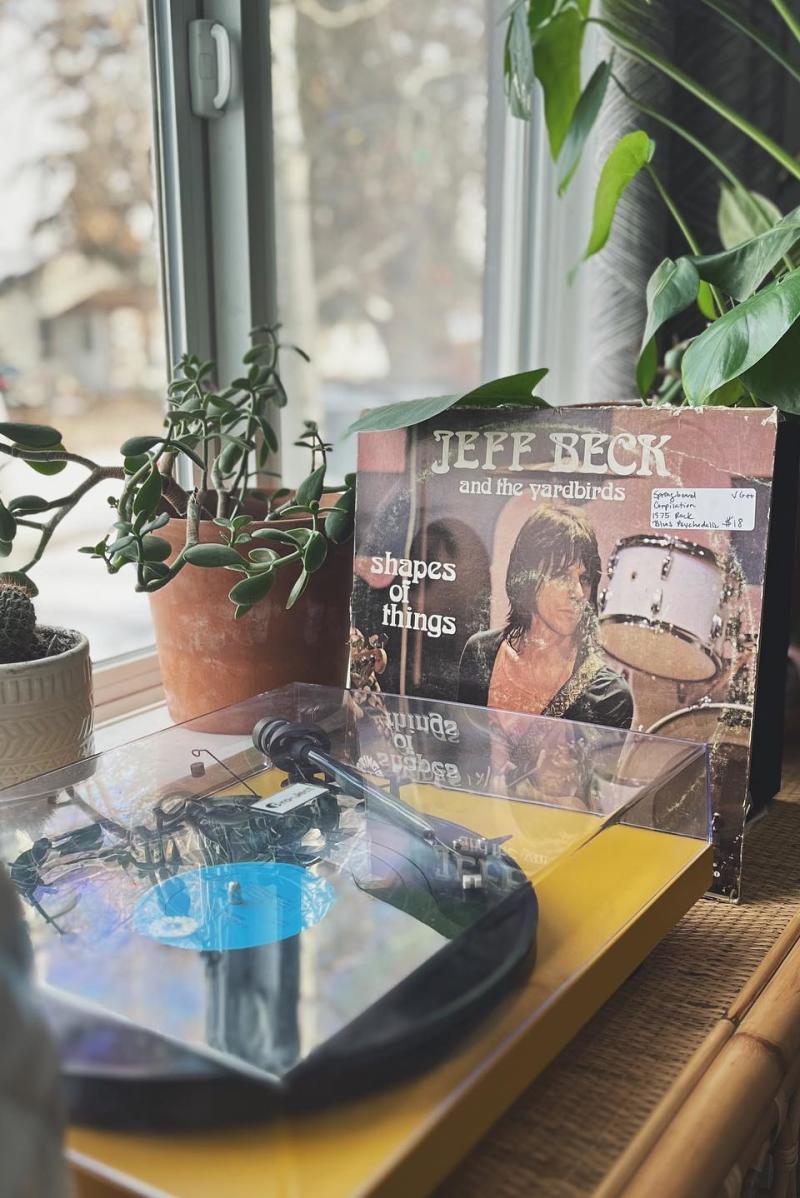 A record player and record on display at All Sales Vinyl