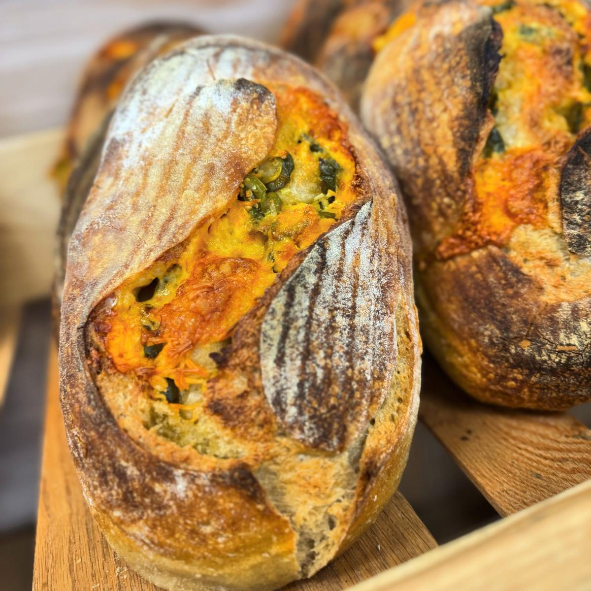 a loaf of cheddar jalapeno sourdough bread