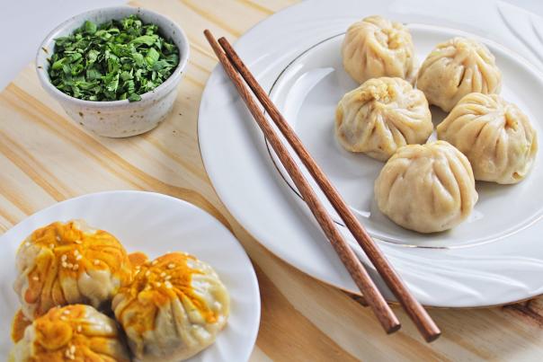 momos with sauce and without sauce with chopsticks