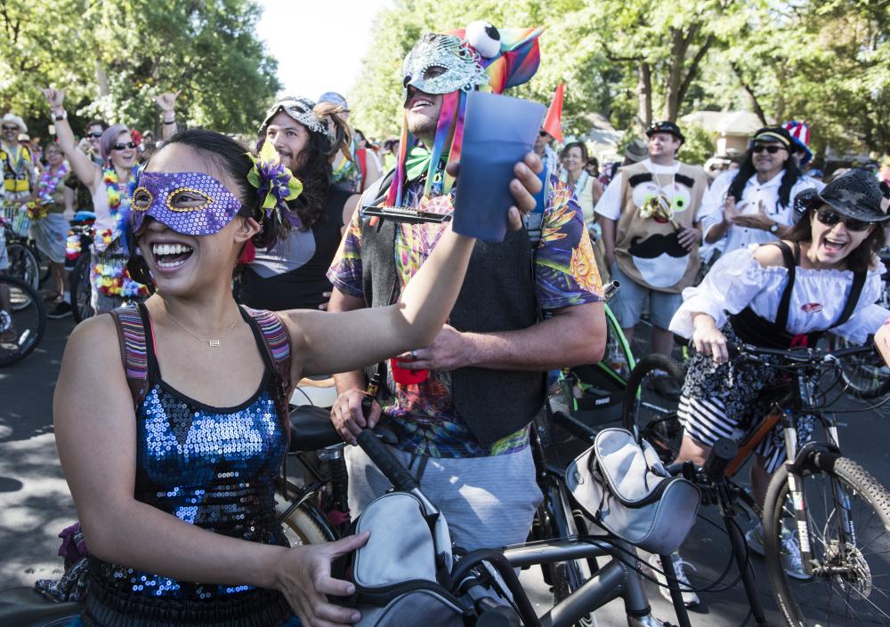 A crowd rides bikes at the annual Tour de Fat Event at New Belgium Brewery