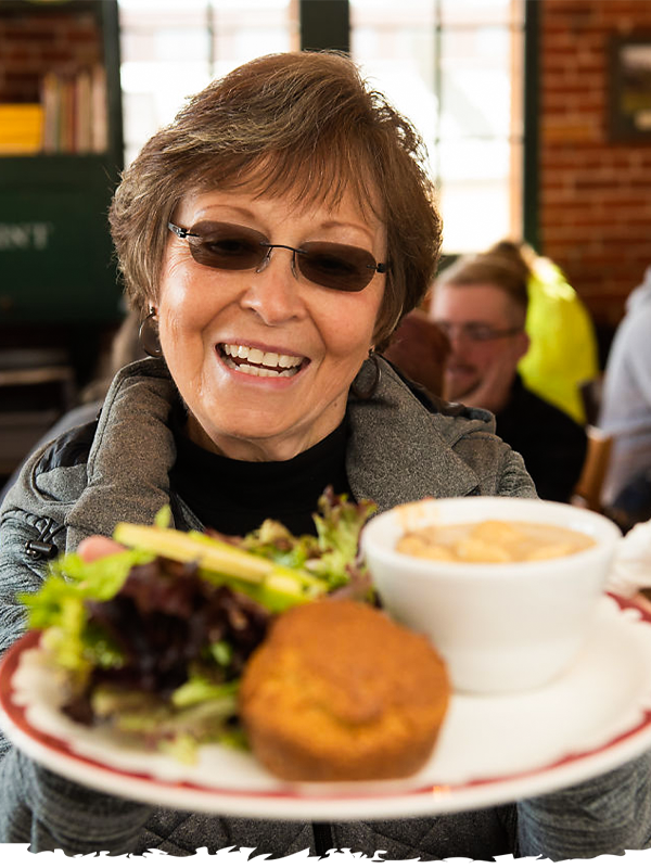 Volunteer Serving Food at FoCo Cafe